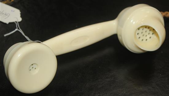 An ivory Bakelite 232L pyramid telephone,